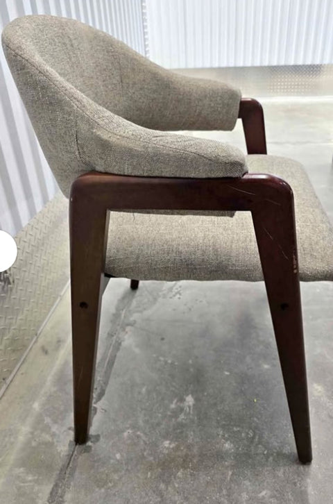 Open back upholstered dining chair with framed wood design