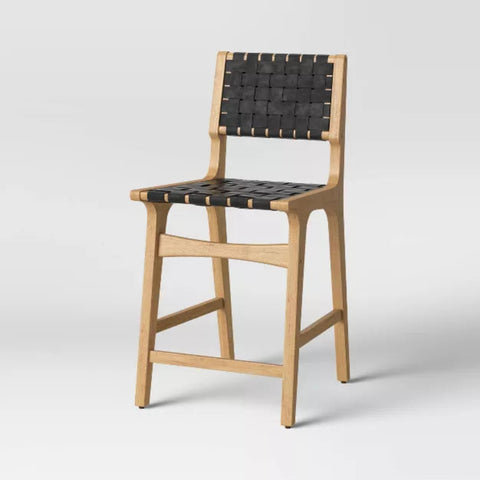Elevate your kitchen island or home bar with the Ceylon Woven Counter Height Barstool from Threshold