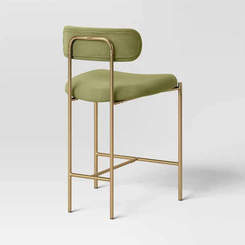 Threshold Orion Luxe counter barstool with upholstered back and brass legs, 24" seat height