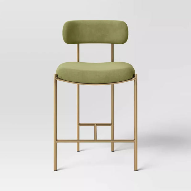 Threshold Orion Luxe counter barstool with upholstered back and brass legs, 24" seat height