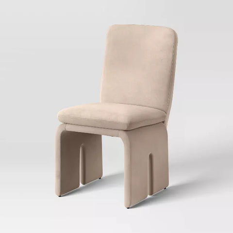 Threshold Safflower sculptural dining chair in dark tan with curved back and upholstered seat
